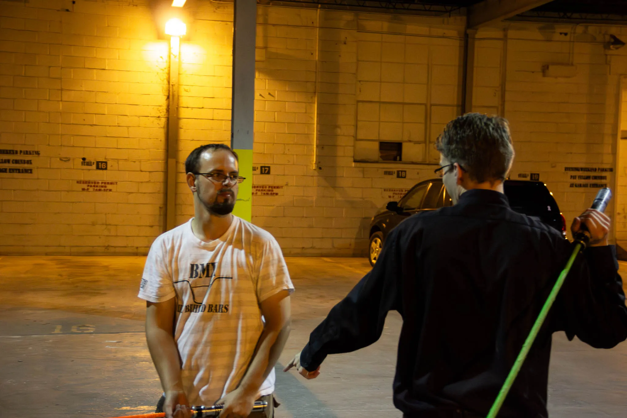Myself giving Eric some literal pointers on lightsaber handling.