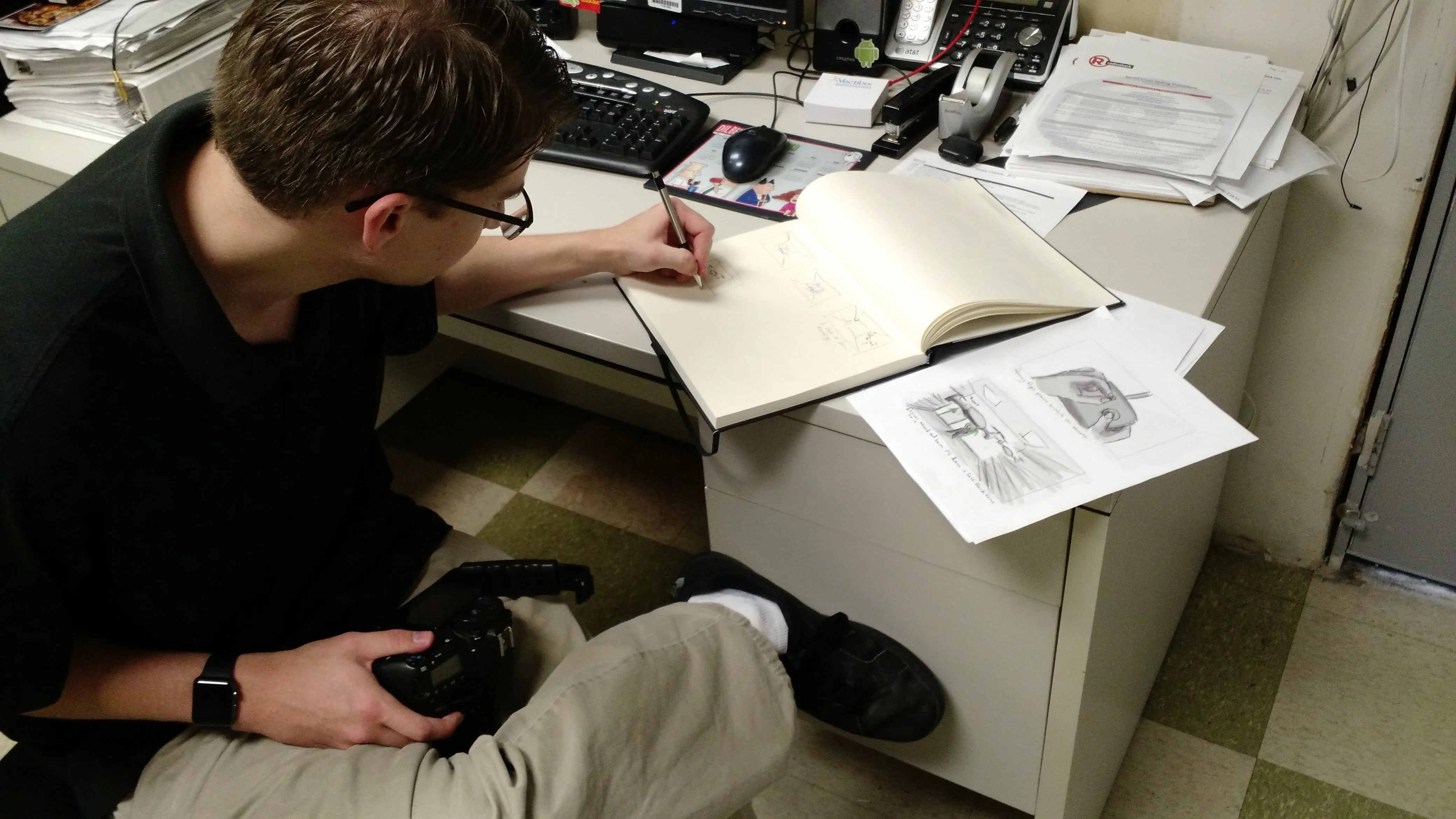 Me sitting down in the office at RadioShack and sketching out how many individual plates we'll need for each shot. The most complex shot in terms of piecing together plates was the shot of the drones lifting off.